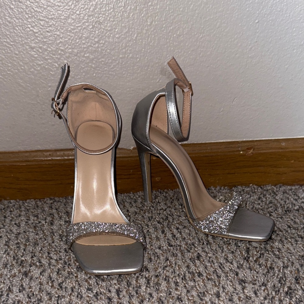 Silver sparkly heels.